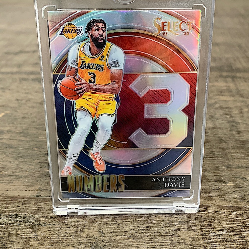 2 select Anthony Davis cards in the holders